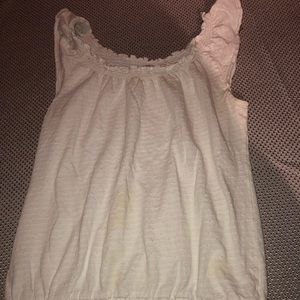 Like new white sleeveless shirt w/ruffled sleeves